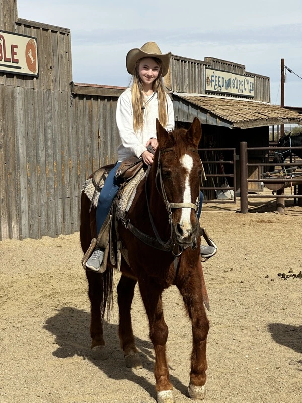 Horseback riding with daughter
